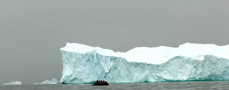 Scale of iceberg, compared to zodiac 