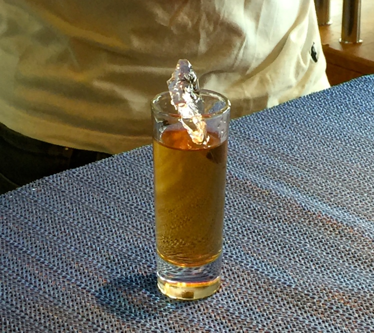 A whiskey shot with a chunk of 30,000-year-old black ice... 
